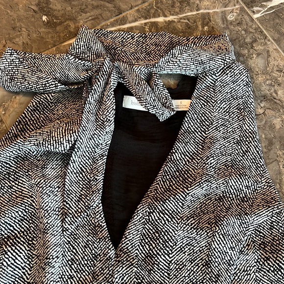 Tank top with open V in the back and a tie around the neck - Picture 3 of 5